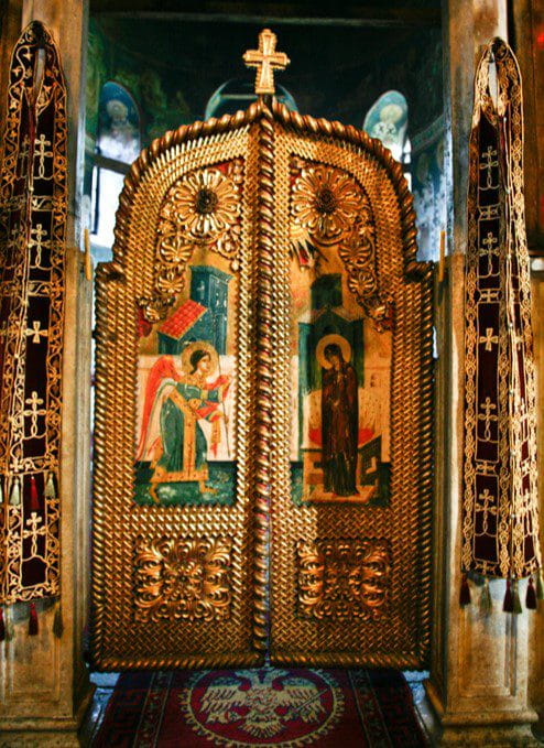 It was partly in response to the 2004 riots that the “Medieval Monuments in Kosovo” — which includes Dečani — were inscribed on the UNESCO List of World Heritage in Danger in 2006. The Medieval Monuments also include the Gračanica Monastery, Our Lady of Ljeviš Church in Prizren, and the Patriarchal Monastery of Peć. Our Lady of Ljeviš was seriously damaged in the 2004 unrest and has since been partially restored. The others escaped the riots without damage.<br />
<br />
A recent public statement from the Eparchy of Raška-Prizren about the Most Endangered list makes much of KFOR’s presence as well as the destruction of 1999 and 2004. They also cite attempted grenade attacks targeting the Dečani Monastery in 2000 — in the immediate aftermath of the war — and in 2007. Kosovo Police arrested the perpetrator of the 2007 attack and he was subsequently sentenced to three and a half years in prison.